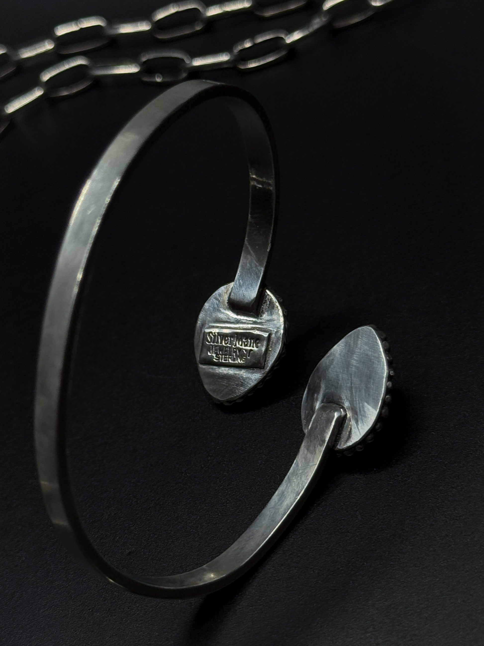 Back plate stamping of onyx cuff