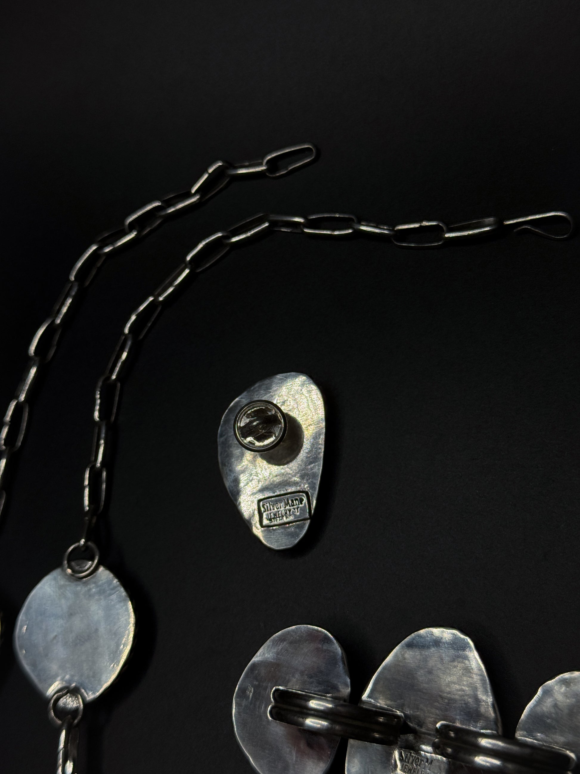 backplate stamping of turquoise pin